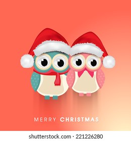 Merry Christmas celebrations, cute owls in santa hat and red scarf wishing on pink background. 