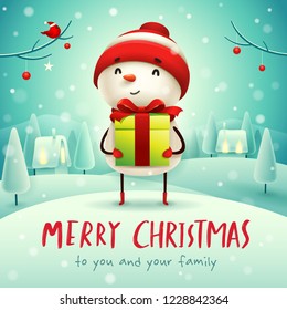 Merry Christmas! Cheerful snowman with gift present in Christmas snow scene winter landscape.