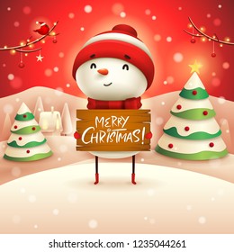 Merry Christmas! Cheerful snowman holds wooden board sign in Christmas snow scene winter landscape. 