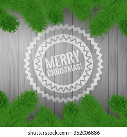 
Merry Christmas! Circle hipster logo. Fir branches on the background of a wooden texture. Stock vector.