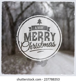 Merry Christmas creative graphic message for winter design.Vector blurred background