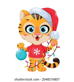 Merry Christmas. Cute cartoon character tiger in Santa hat holding Christmas tree decorations