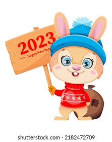 Merry Christmas. Cute cartoon character rabbit holding wooden sign 2023. Merry Christmas and Happy New year.