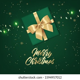 Merry Christmas, decorative design elements, winter banner, celebration background, realistic lights, christmas gift with gold bow, green background vector 