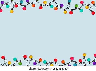 Merry Christmas garland bulb background. Colorful christmas light balls on blue backdrop. Greeting card invitation party template. Star shape ball red, white,green. Christmas frame,  border, banner.