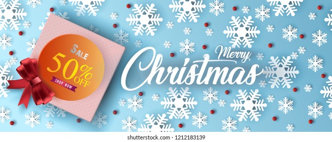 Merry Christmas with gift box, snowflake and shopping icons concept on blue background. Vector illustration.