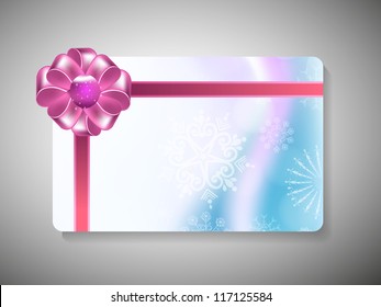 Merry Christmas gift card with pink ribbon. EPS 10.