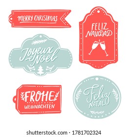 Merry Christmas gift tags with different european languages greetings. Feliz Navidad in Spanish, Frohe Weihnachten in German, Joyeux Noel in French. Red and blue, vintage hand lettering