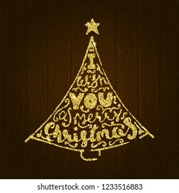Merry Christmas. Gold text on wooden background