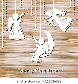 Merry Christmas Greeting Card with Angels on a wood background