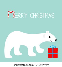 Merry Christmas greeting card. Arctic polar bear cub. Gift box present. Cute cartoon baby character. Red giftbox bow. Candy cane stick text. Flat design. Blue winter background Vector illustration