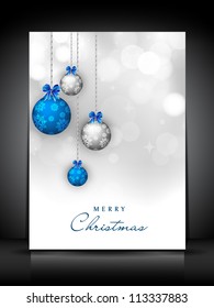 Merry Christmas greeting card with hanging decorative eve balls, snowflakes and light background. EPS 10.