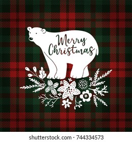Merry Christmas greeting card, invitation. Hand drawn white polar bear with fir tree branches. Floral decoration with poinsettia and mistletoe. Tartan checkered plaid, vector illustration background. 