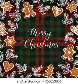 Merry Christmas greeting card, invitation with hand drawn Christmas tree branches and gingerbread cookies. White text over tartan checkered plaid, vector illustration background.