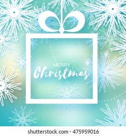 Merry Christmas greeting card. Paper cut snowflakes on blue background with origami frame Gift box. Merry Christmas for poster, banner, web,header. Invitation Template. Place for your Text.