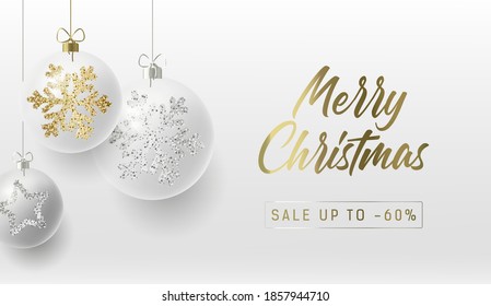 Merry Christmas greeting card or promo poster with white realistic Christmas balls with golden and silver snowflakes ornament sparkle on them, golden calligraphy copy