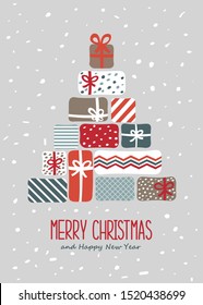 Merry Christmas greeting card with Christmas tree made from gift boxes.
