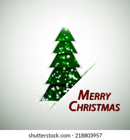 Merry Christmas Greeting Card with Christmas Tree and shiny stars on paper