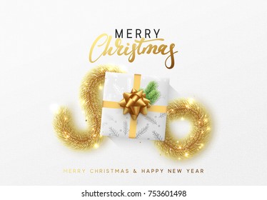 Merry Christmas greeting card. Xmas holiday background, gift box with gold tinsel.