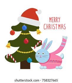 Merry Christmas greetings from cartoon bunny rabbit in pink scarf sitting under decorated Christmas tree with Santas hat on top vector illustration