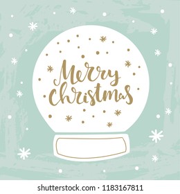 Merry Christmas hand lettering in snow ball illustration. Modern calligraphy greeting card