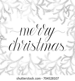 Merry Christmas hand written calligraphy greeting card with silver fir-branches. hand drawn lettering and calligraphy cute phrase