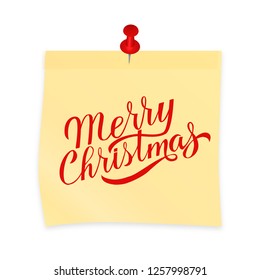 Merry Christmas hand written on yellow sticky note attached with red pin. Realistic sticker and pushpin isolated on white. Holidays vector illustration. Easy to edit template for your design projects.