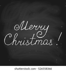 Merry Christmas! Handwritten vector text in chalk style on blackboard.