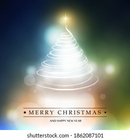 Merry Christmas, Happy Holidays Card - Christmas Tree Shape Made from Bright Spiralling Light on Colorful Blurry Background 