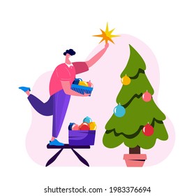 Merry Christmas and Happy Holidays. Man holding a box with festive balls Stand on Chair Decorate Christmas Tree Indoors Put Star on Spruce Top Before Xmas. New Year Cartoon Flat Vector Illustration