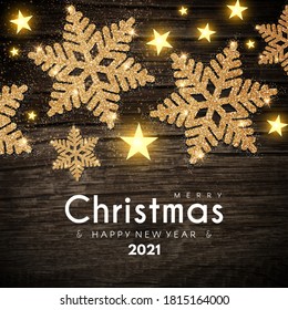 Merry Christmas and Happy New 2021 Year Shining Background. Elegant New Year Decoration Gold Snowflakes, Stars, Wood Texture and Light Effect.