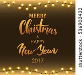 Merry Christmas & Happy New Year lettering. Christmas handwritten gold typography for card, poster, flyer, postcard. Vector illustration.
