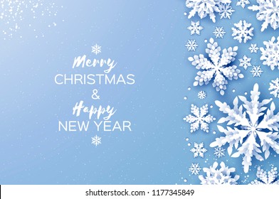 Merry Christmas and Happy New Year Greetings card. White Paper cut snowflakes. Origami Winter Decoration background. Seasonal holidays. Snowfall. Space for text. Blue. Vector