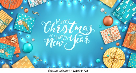 Merry Christmas and happy new year banner with Christmas decoration: colorful balls, gift box and garlands on blue background. Xmas holiday greeting card, beautiful Christmas sale poster