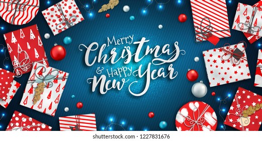 Merry Christmas and happy new year banner with Christmas decoration: colorful balls, red and white gift box and garlands on blue background. Xmas holiday greeting card, beautiful Christmas sale poster