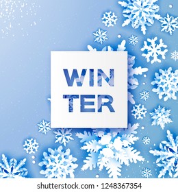 Merry Christmas and Happy New Year Greetings card. White Paper cut snowflakes. Origami Decoration background. Seasonal holidays. Snowfall. Square frame. Winter text. Blue.