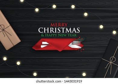 Merry Christmas and Happy New Year 2020 greeting card on wood background
