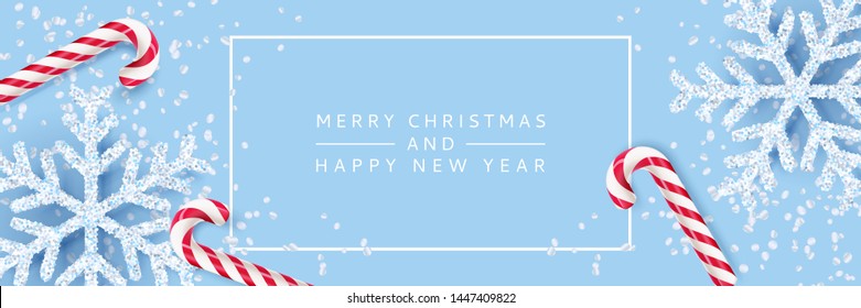 Merry Christmas, Happy New Year banner, poster blue background. Vector 3d realistic illustration of white snowflakes and striped stick candy. Modern minimal winter holiday gifts concept.