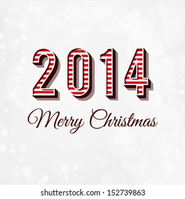 Merry Christmas and Happy New Year Card. 2014 - typography greeting design with 3d letters and bokeh background