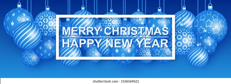 Merry Christmas and happy New year. Wide canopy with a Variety of suspended balls. Blue background.