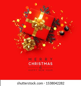 Joyeux Noël et Bonne année. Conception d'arrière-plan de Noël avec coffret cadeau réaliste, flocon de neige noir et confetti doré éclatant. Affiche sur le Web, carte de voeux. Objet vu d'en haut. Plat-lay, vue supérieure