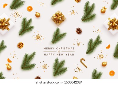 Merry Christmas and Happy New Year. Xmas background with realistic festive decorative design elements. Pine and spruce branches, gift box, pine cone, orange, ball bauble. Flat lay, top view.