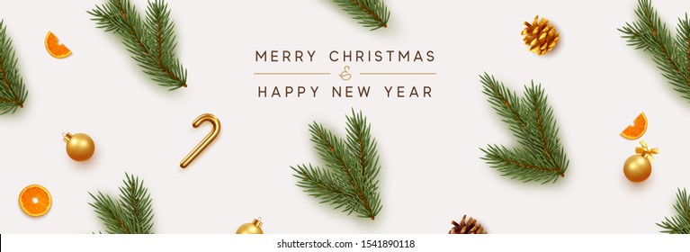 Merry Christmas and Happy New Year banner. Xmas background with realistic festive decorative design elements. Pine and spruce branches, pine cone, orange, ball bauble. Flat lay, top view.