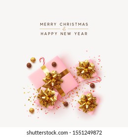 Merry Christmas. Happy New Year. Realistic pink gift boxes, glitter gold confetti, Chocolate round candy in foil, sweet cane. Xmas present. flat lay, top view. Festive background. Vector illustration