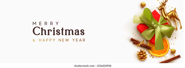 Merry Christmas and Happy New Year. Xmas composition realistic design elements, gift box, cinnamon, orange slice, chocolates, gold glass reindeer, metal deer. Holiday banner, poster, greeting card.