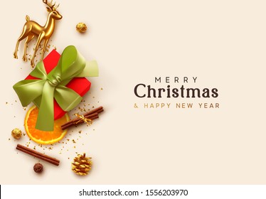 Merry Christmas and Happy New Year. Xmas composition realistic design elements, gift box, cinnamon, orange slice, chocolates, gold glass reindeer, metal deer. Holiday banner, poster, greeting card.