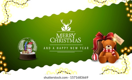 Merry Christmas and happy New Year, green and white postcard with wavy diagonal line, garland, greeting logo with deer, snow globe and present with Teddy bear