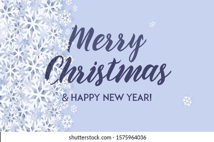 Merry Christmas and happy New Year Greetings card. White 3d snowflakes and calligraphy text between them