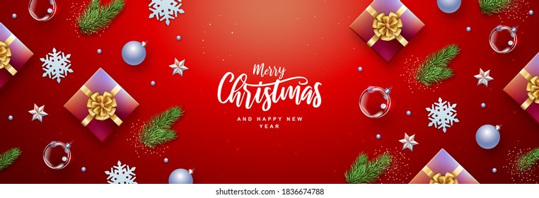 Merry Christmas and Happy New Year greeting card. Top view Christmas holiday background with fir tree, snowflakes, glass balls, gift boxes and stars