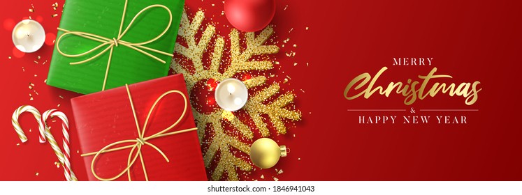 Merry Christmas and Happy New Year banner. Holiday background with realistic green and red gift boxes, candles, candy canes, Christmas balls, confetti and snowflake. Vector illustration.